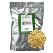 MONTEREY BAY HERB CO Ginger Root Powder on a spoon for warm cooking aroma.