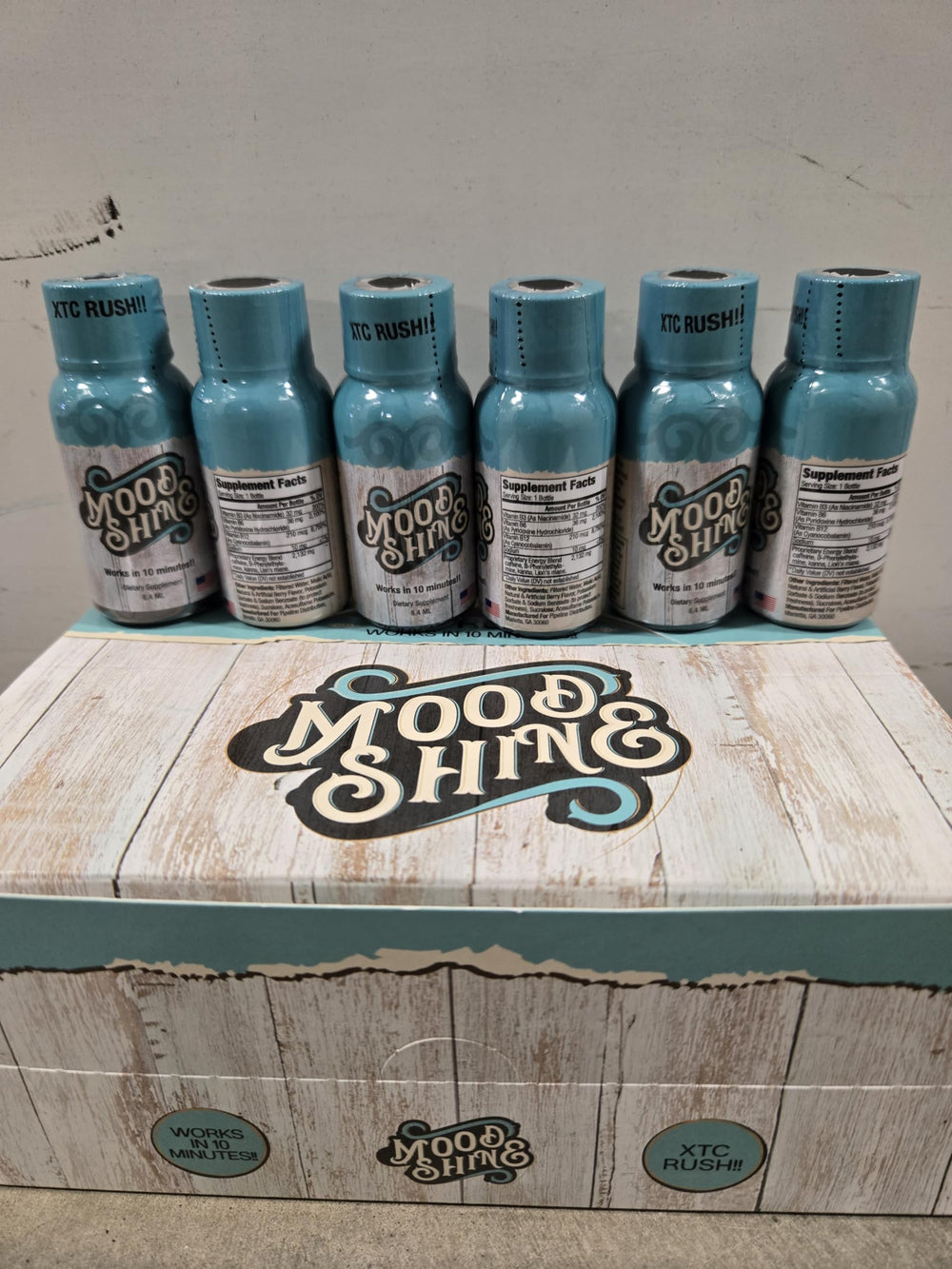 Mood Shine energy bottle in turquoise, ready to boost focus on the go
