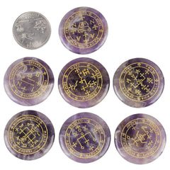 Amethyst palm stone set with velvet bag for portable calm on the go.