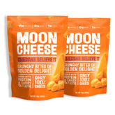 Moon Cheese Cheddar Believe It crunch bites show a bold crunchy texture for on-the-go protein