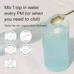 Moon Juice Magnesi-Om blue lemonade in a glass