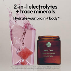 Moon Juice Mini Dew dissolving in water for refreshing brain-friendly hydration