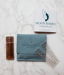 Moon Rabbit Ear Seeds Crystal 40 set with sparkling Swarovski points for portable relaxation support.