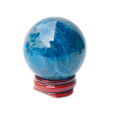 MoonlightCrystal energy blue apatite sphere 50mm as a striking table centerpiece