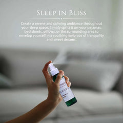 Moonwater Elixirs Lavender Sleep Spray on pajamas for a cozy pre-sleep routine.