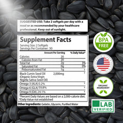 Pouring Mother Nature Organics Superfoods for Organic Living black seed oil softgels from amber bottle for easy daily dosing.