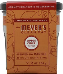Mrs. Meyer's Apple Cider candle wick ready for a clean burn.