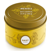 Mrs. Meyer's Daisy Tin Candle, front view, adds fresh garden scent to any room.