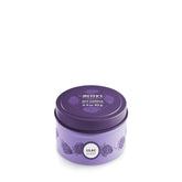 Mrs. Meyer's Lilac candle tin emits a fresh floral scent for a bright room.