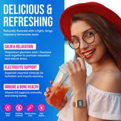 Prepared Vitamuse drink in hand, showcasing bright raspberry lemonade flavor and refreshment.