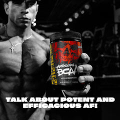 Mutant Hardcore BCAA Watermelon powder scoop ready to mix after training