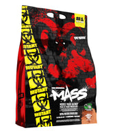 Mutant Mass weight gainer bottle pour for post-workout fueling.
