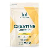 Myprotein Creatine Gummies lemon label close-up highlighting 5 g per serving for performance support.