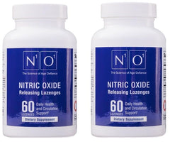 N1O1 Nitric Oxide Lozenges packaging on desk, suggesting reliability and quality.