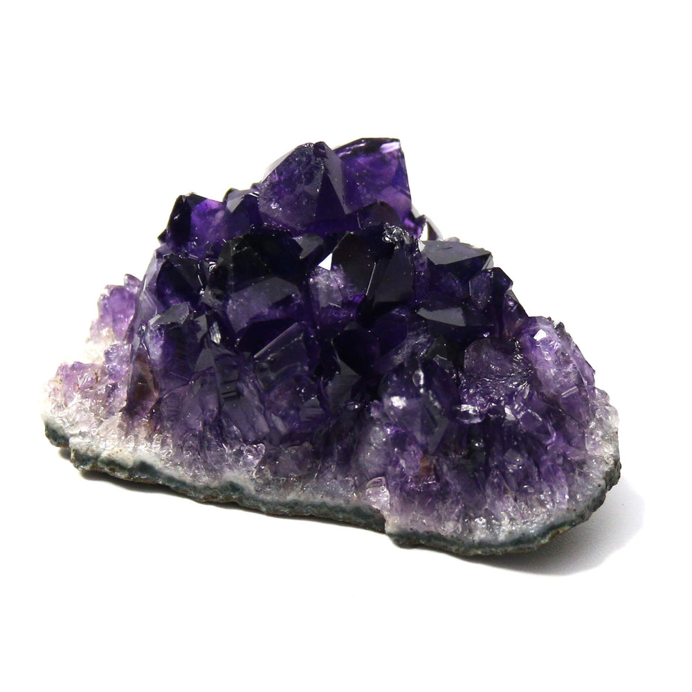 Namzi raw amethyst stones crystal cluster close view highlighting natural color and sparkle.