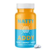 Natty Addy Maximum Strength Brain Support bottle on desk suggesting a daily focus routine.