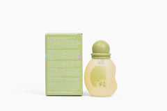Natura Baby Massage Oil being poured onto tiny hands.