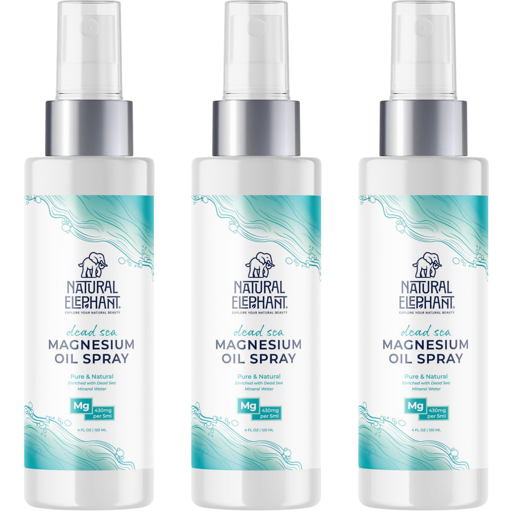 Natural Elephant Dead Sea magnesium oil spray bottle on countertop for convenient topical use.