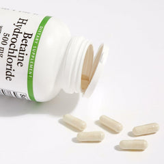 Natural Factors Betaine HCL 500 mg capsules close-up for easy swallowing