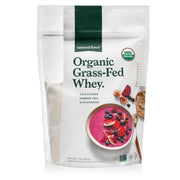 Natural Force grass-fed whey powder poured for a clean post-workout shake