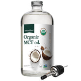 Natural Force Organic MCT Oil bottle on a counter, ideal for keto meals and smoothies.