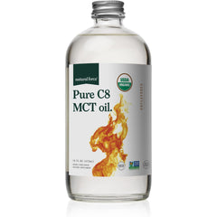 Natural Force Organic Pure C8 MCT Oil bottle on kitchen counter, ideal for keto coffee
