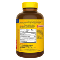 Close-up of Nature Made Super C tablets showing vitamin C, D3, and zinc, emphasizing antioxidant support.