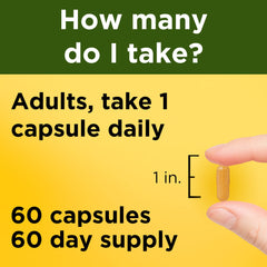 Two Nature Made Turmeric Curcumin 500 mg capsules poured into hand