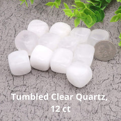 Nature Wonders clear quartz tumbled stones close-up with beeswax finish for decor and energy cleansing.