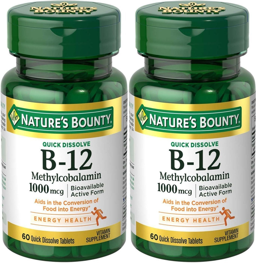 Nature's Bounty B12 microlozenge bottle pour; supports energy metabolism and nervous system wellness.