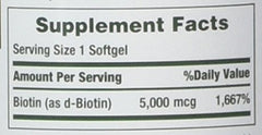 Close-up of Nature's Bounty Biotin 5000 mcg bottle, daily use