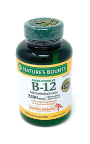 Nature's Bounty Quick Dissolve B-12 under-tongue tablet dissolving rapidly for fast support.