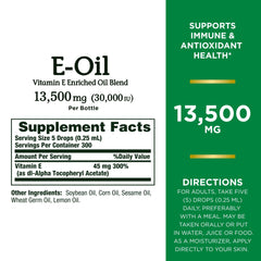 Nature’s Bounty Vitamin E Oil being applied to skin for moisturized radiance.