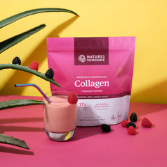 Nature's Sunshine collagen powder pouring into glass ready for hydration