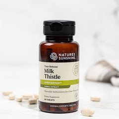 Close-up of Nature's Sunshine Milk Thistle tablets highlighting time-release design for steady release