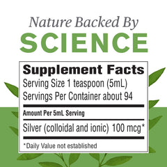 Pouring Nature's Sunshine Silver Shield Liquid into a teaspoon for easy daily use