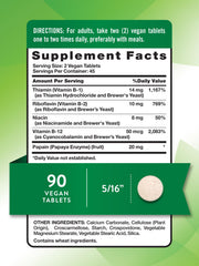 Nature's Truth B-Complex vegan tablets close-up highlights plant-based nutrition.
