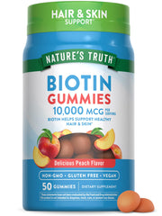 Nature's Truth Biotin Gummies peach bottle for daily hair and skin support.