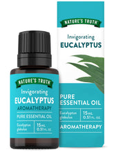Nature's Truth eucalyptus essential oil bottle pouring for diffuser aromatherapy.