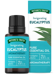 Nature's Truth eucalyptus essential oil bottle pouring for diffuser aromatherapy.