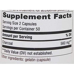Nature's Way Activated Charcoal Hi Po bottle beside glass to illustrate daily use setting
