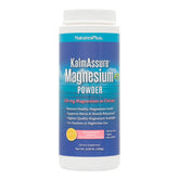 Nature's Plus KalmAssure pink lemonade powder in a jar for daily relaxation.
