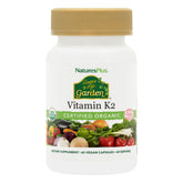 NaturesPlus Source of Life Garden vitamin K2 bottle front showcases organic blend and vegan capsules.
