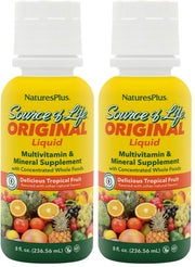 NaturesPlus Source of Life Liquid tropical fruit bottle on countertop, rich in essential nutrients for daily energy support