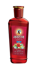 Navratna Cool Oil ingredients blend close-up showing herbal cooling formula
