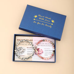 NCB gift box with two bracelets and card, ready for gifting.