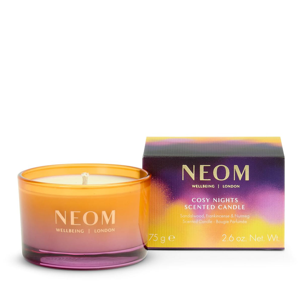 Neom Cosy Nights Travel Candle sandalwood close-up for warm relaxation.