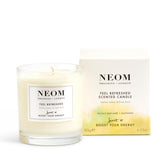 Neom Feel Refreshed candle closeup highlighting lemon and basil aroma for focus