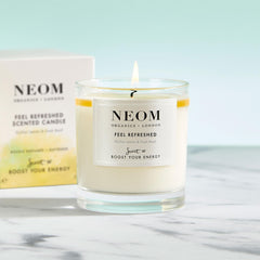 Neom Feel Refreshed packaging showing premium natural wax and long burn