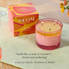 Mint and mandarin notes reflected in NEOM Great Day candle profile.